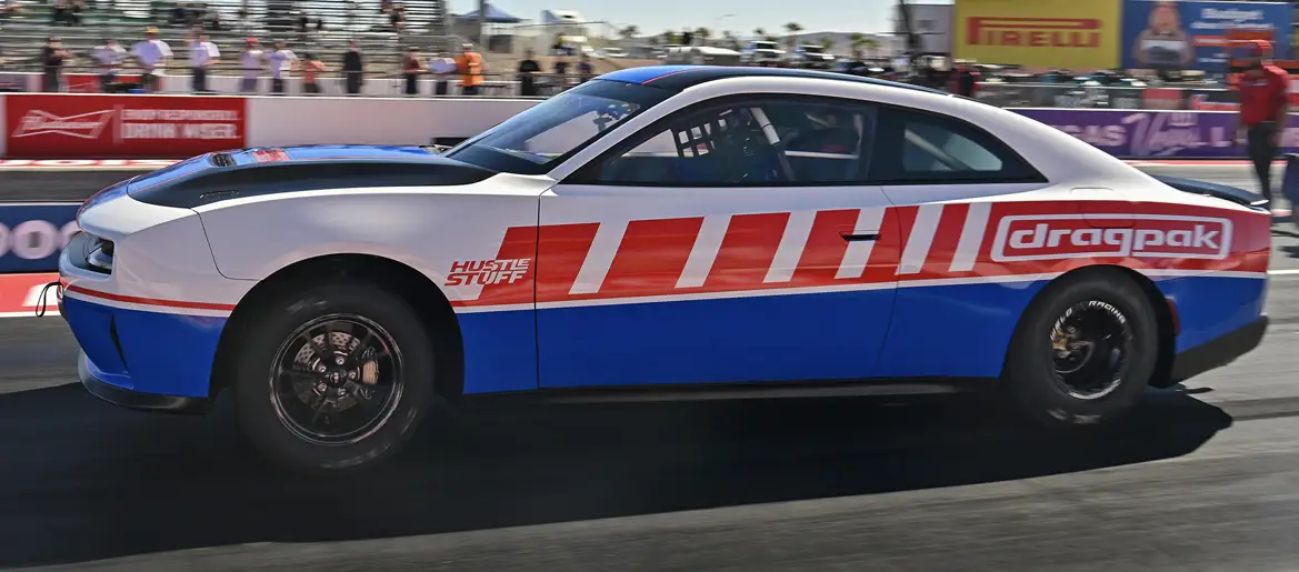 Image of a super stock car, with mopar direct connection branding