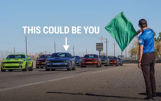 An image of cars lined up on a raceway, with a man waving a green flag, and an arrow pointing to one of the cars with text reading 'this could be you'